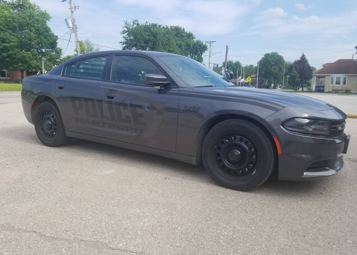 Hartford police car with reflective door lettering in daylight